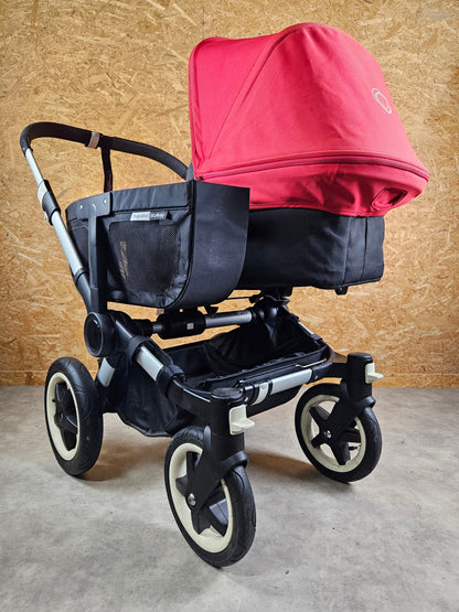 Bugaboo - Donkey Geschwister Kinderwagen (1 Liegewanne / 1 Sportsitz) Inkl. Seitliche Gepäcktasche - Schwarz Rot